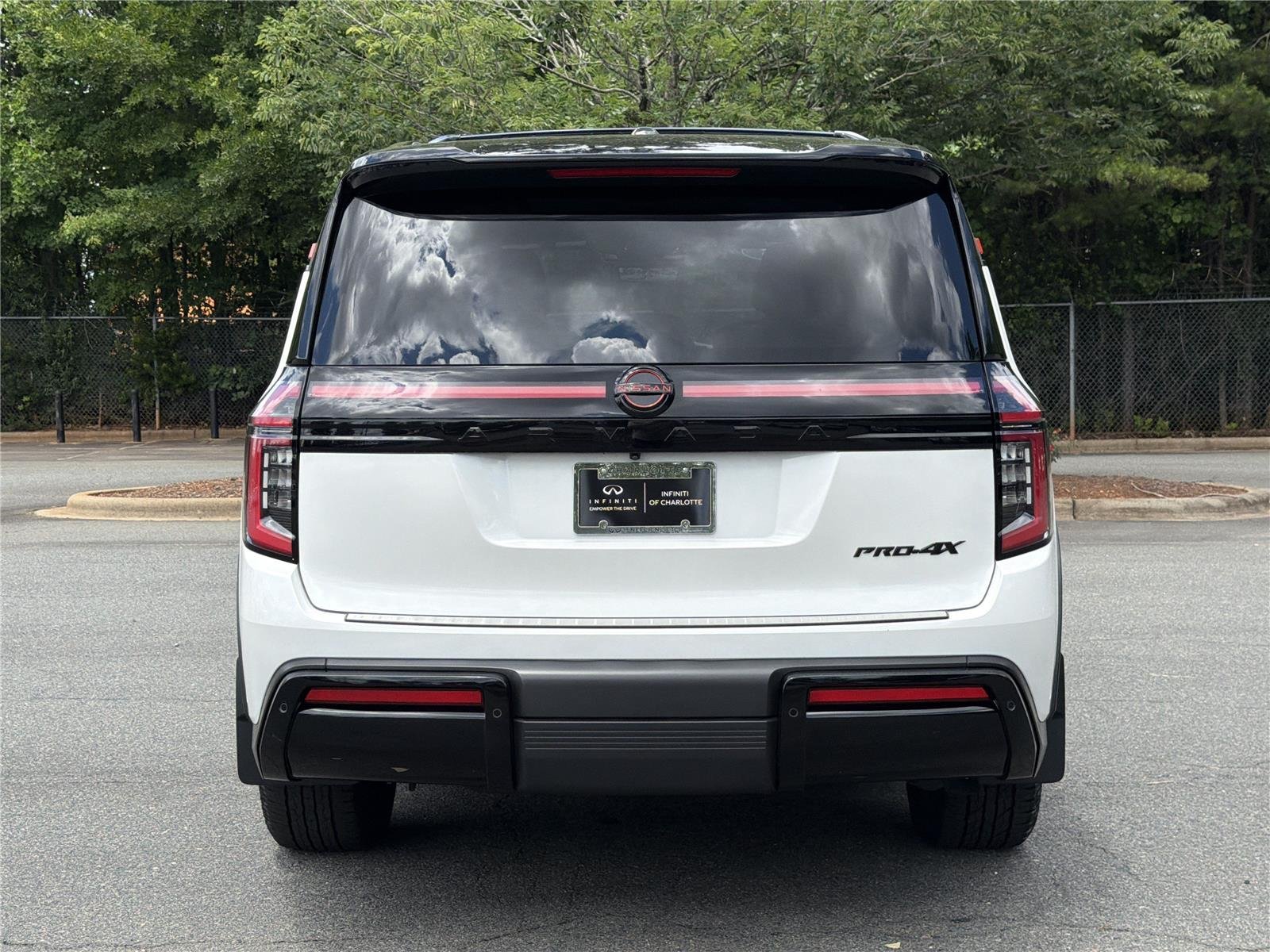 Used 2025 Aspen White Tricoat/Super Black Nissan PRO-4X image 23