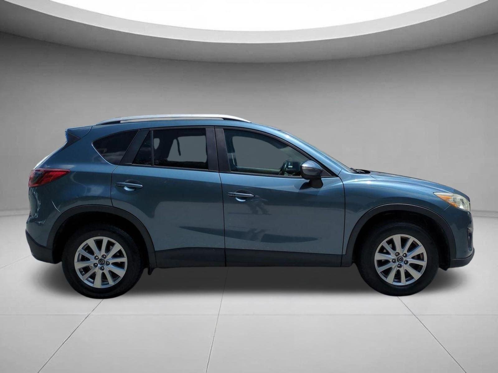 Used 2015 Blue Reflex Mica Mazda Touring image 6