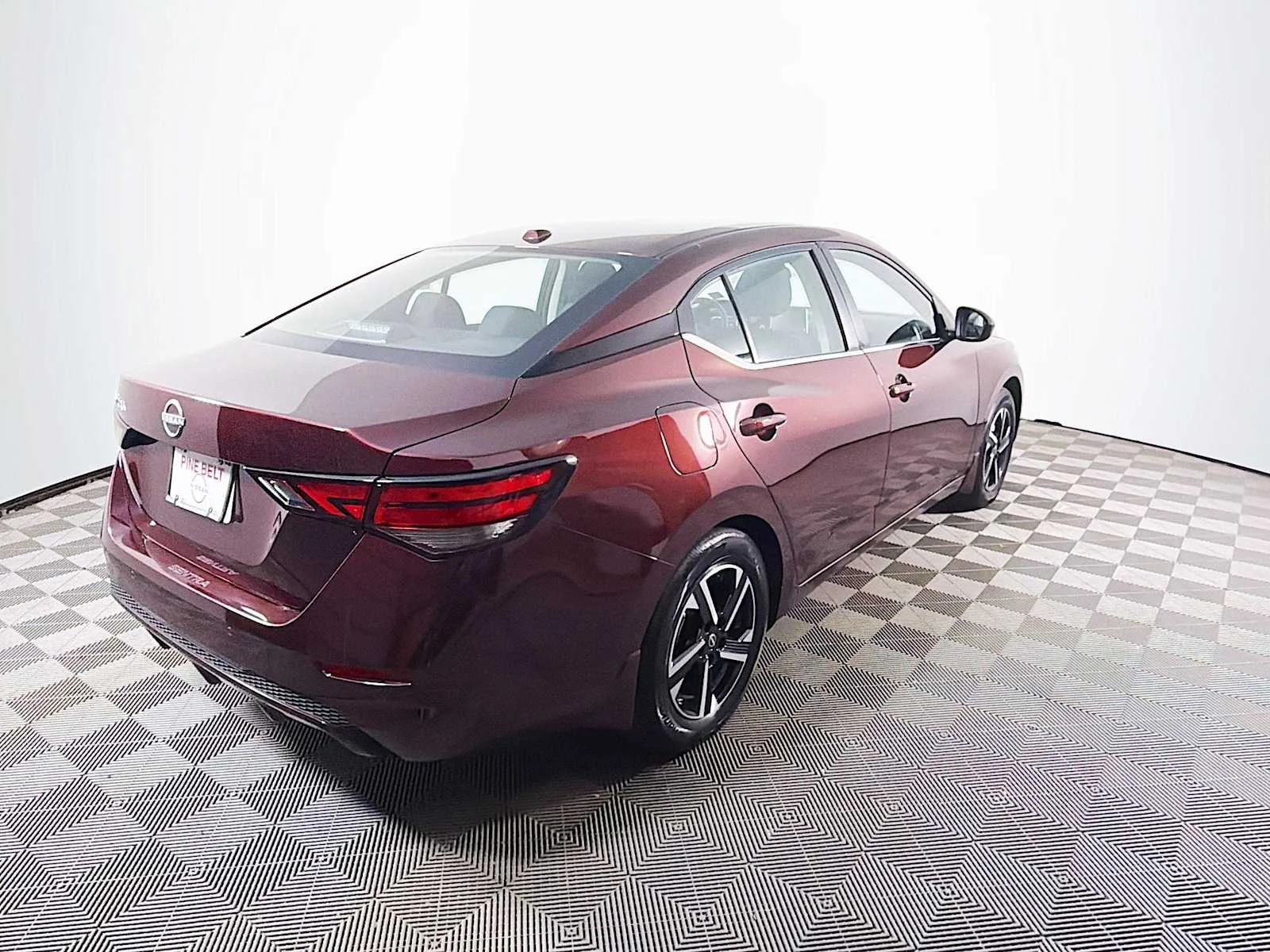Used 2025 Rosewood Metallic Nissan SV image 4