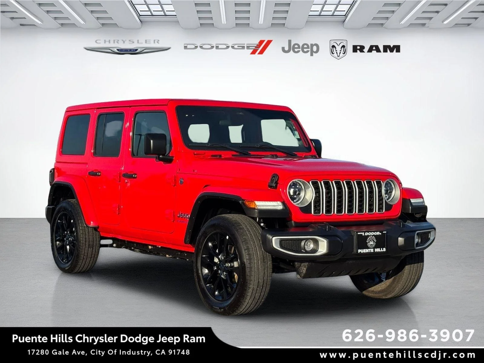 Certified Used 2025 Firecracker Red Clearcoat Jeep Sahara image 1