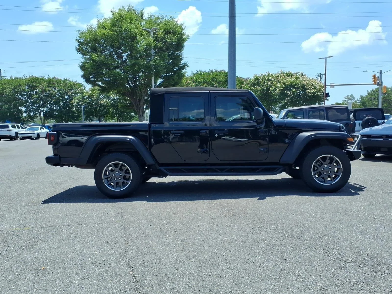 Used 2024 Black Clearcoat Jeep Sport image 10