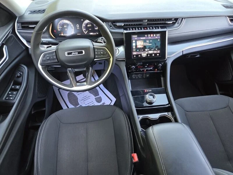 Used 2023 Bright White Clearcoat Jeep Laredo image 9