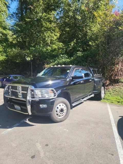 Used 2012 Black Clearcoat Ram Laramie Longhorn image 1