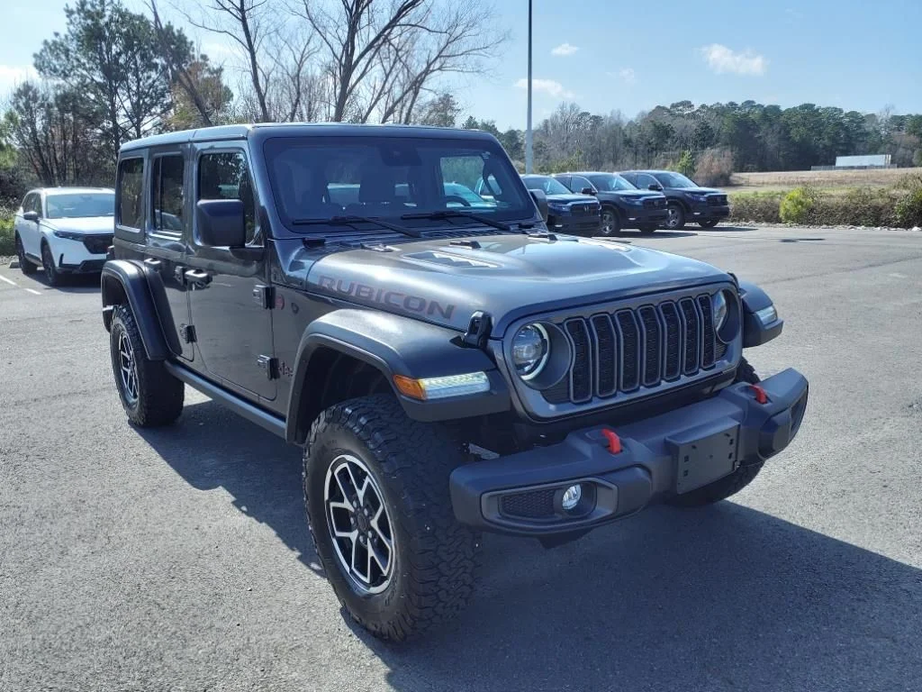 Used 2024 Granite Crystal Clearcoat Metallic Jeep Rubicon image 1