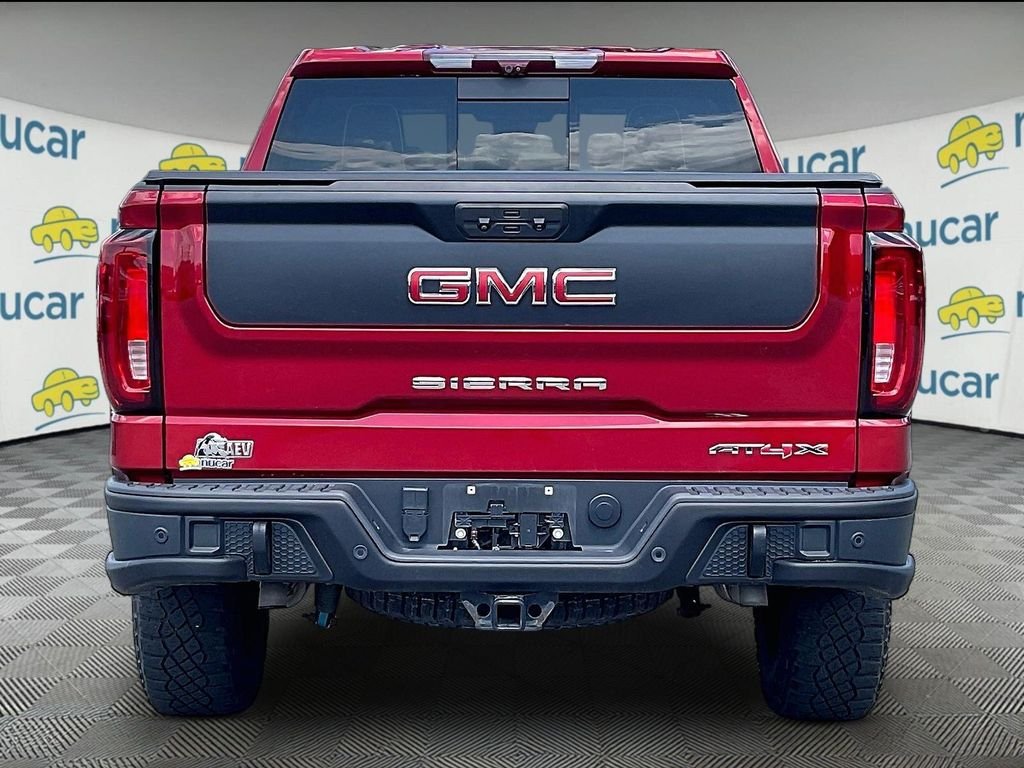 Used 2023 Volcanic Red Tintcoat GMC AT4X image 5