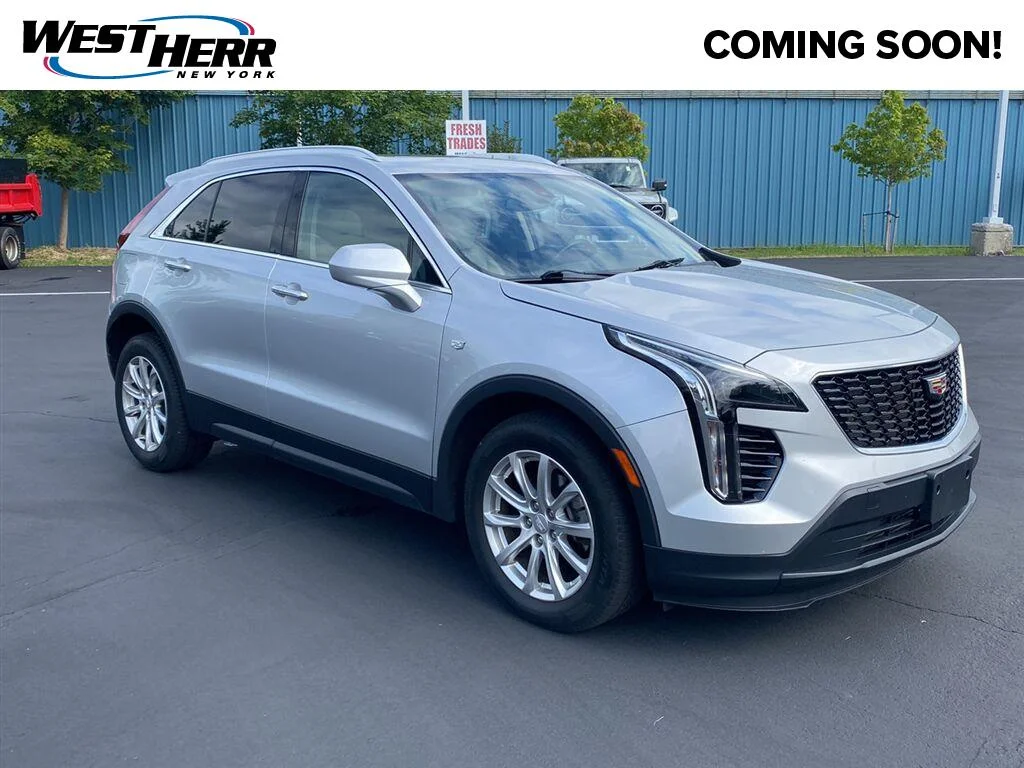 Used 2019 Radiant Silver Metallic Cadillac AWD Luxury image 1