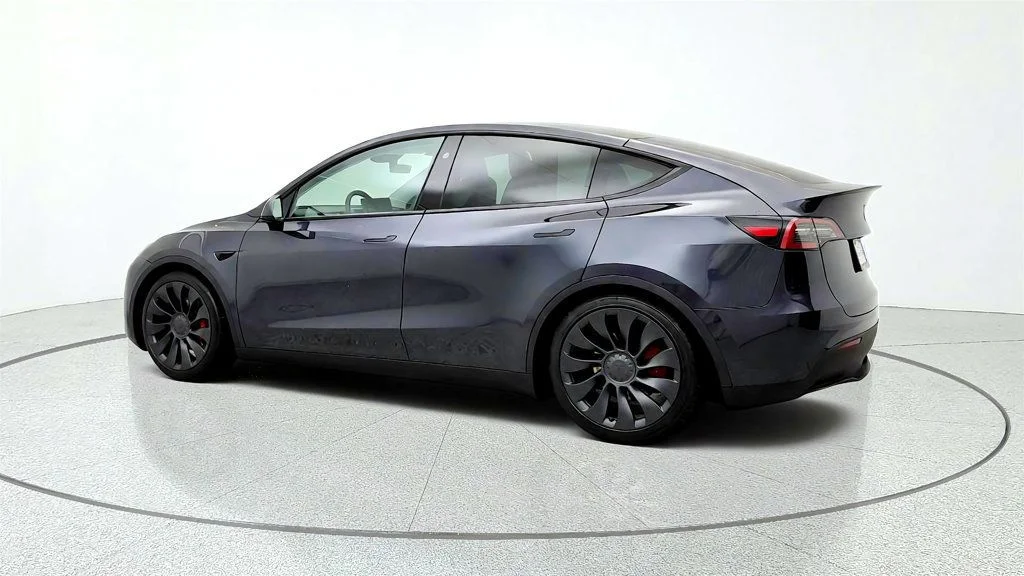 Used 2024 Stealth Grey Tesla Performance AWD w/ White & Black Interior image 7