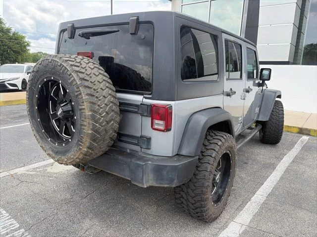 Used 2015 Silver Jeep Unlimited Sport image 5