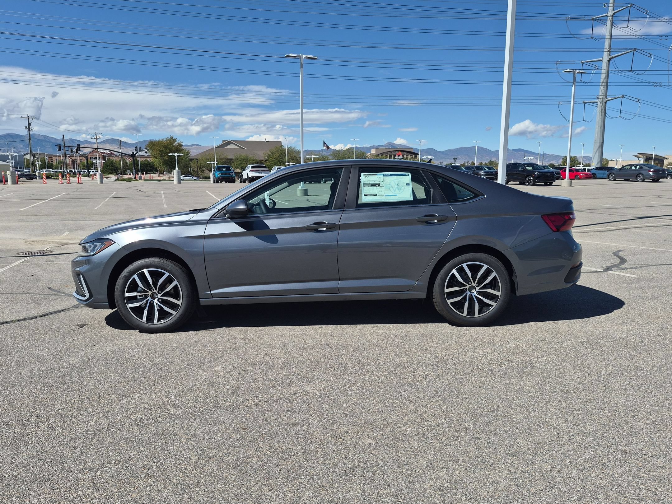 New 2027 Platinum Gray Metallic Volkswagen SE image 7