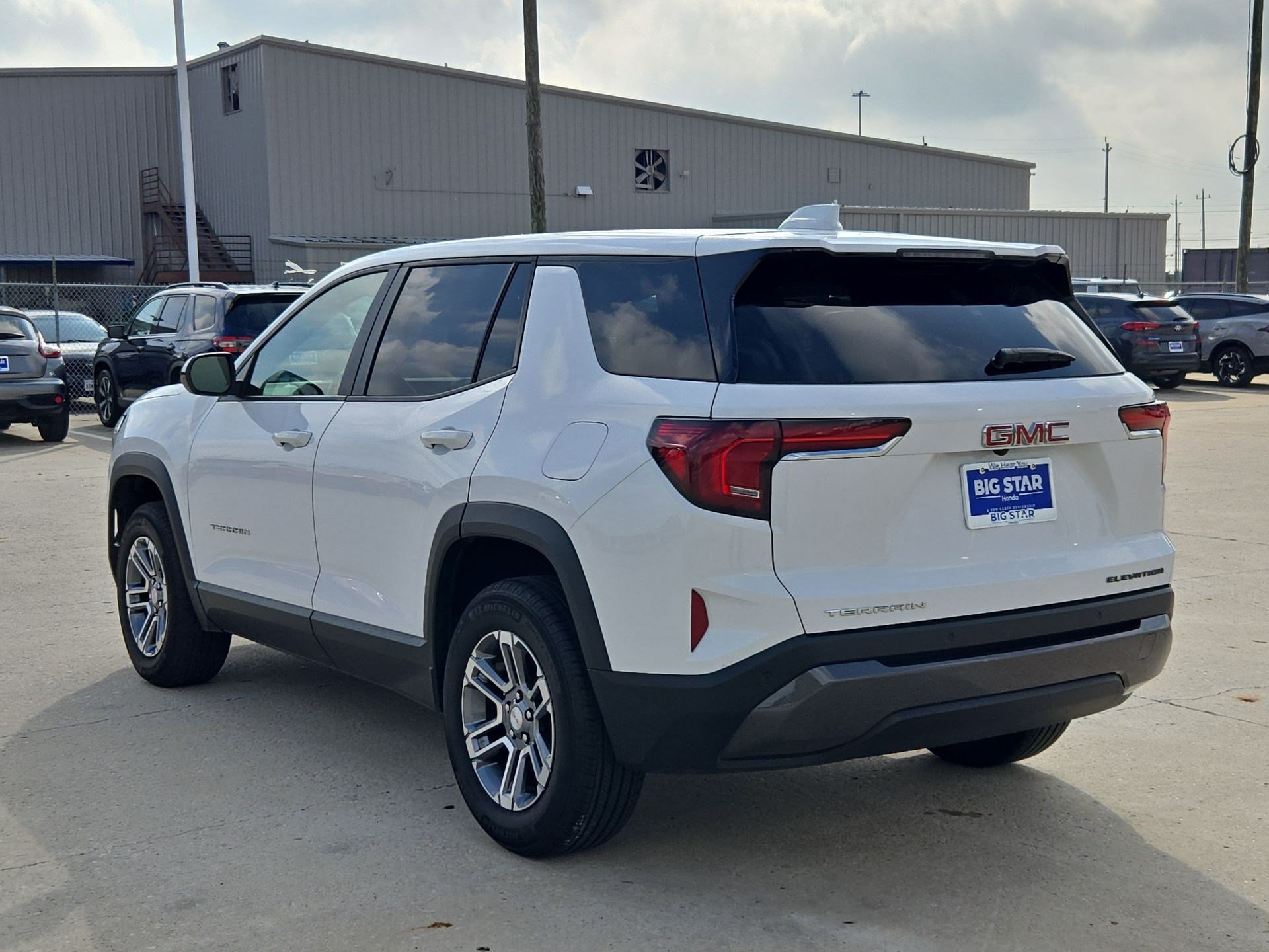 Used 2026 Summit White GMC FWD Elevation image 5