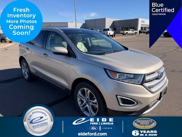 Used 2018 Gold Ford Titanium image 1