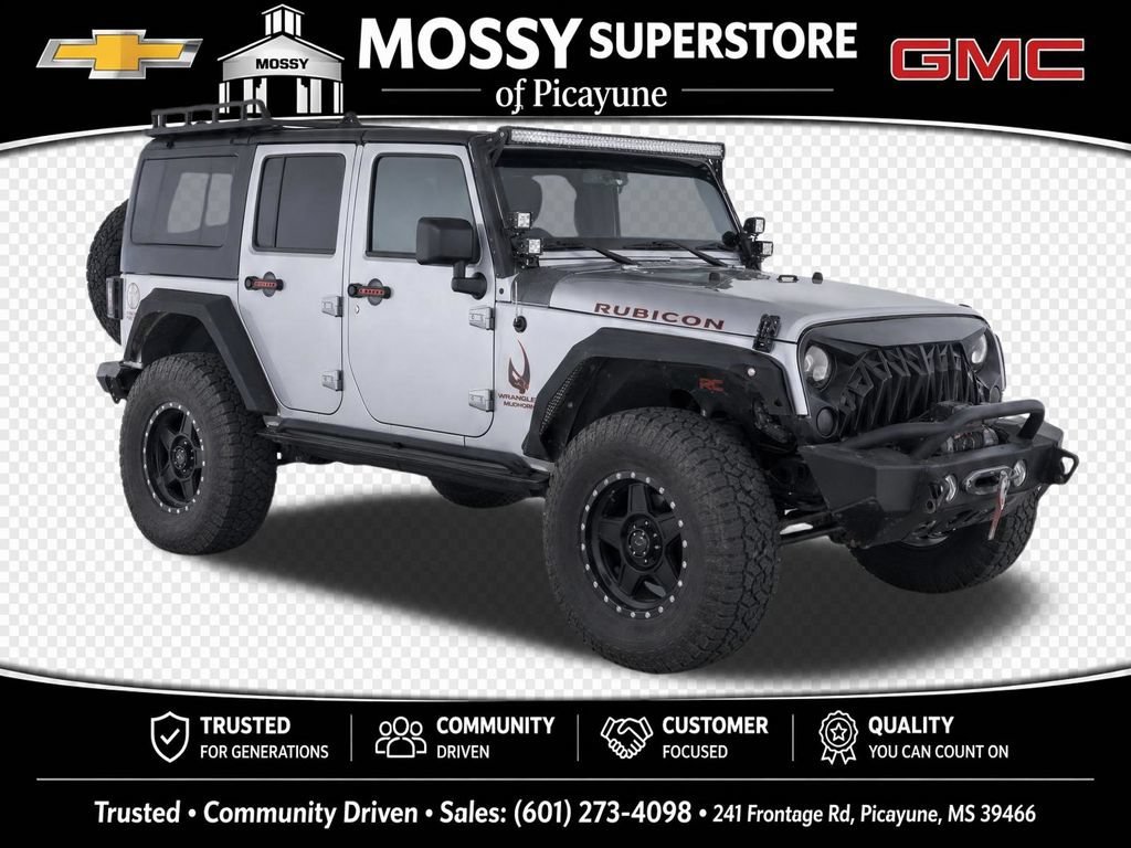 Used 2015 Jeep Wrangler Unlimited Rubicon with VIN 1C4BJWFG0FL596098 for sale in Picayune, MS