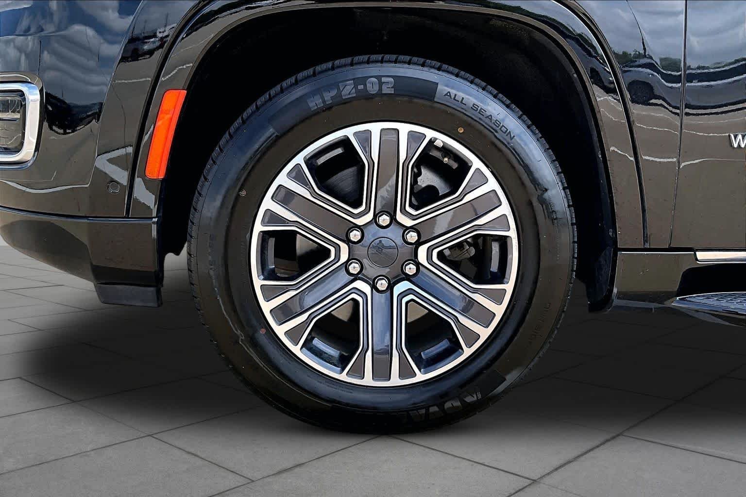 Used 2023 Diamond Black Crystal Pearlcoat Jeep Series II image 11