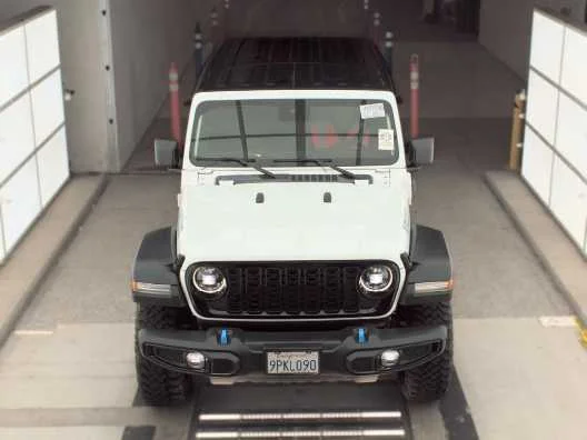 Used 2024 Jeep Wrangler 4xe Willys 4XE with VIN 1C4RJXN69RW294292 for sale in Kansas City