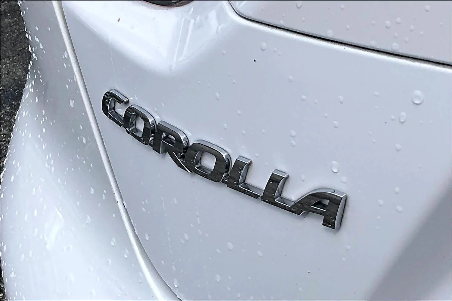 Used 2021 Super White Toyota LE image 10