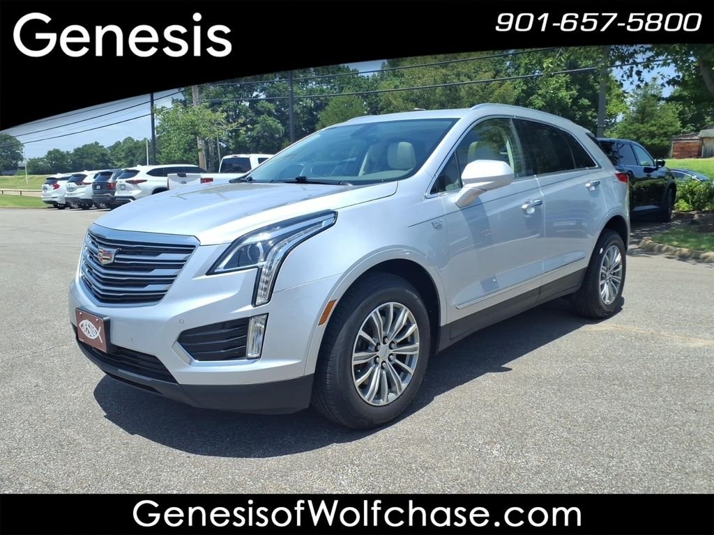 Used 2018 Silver Cadillac Luxury image 1