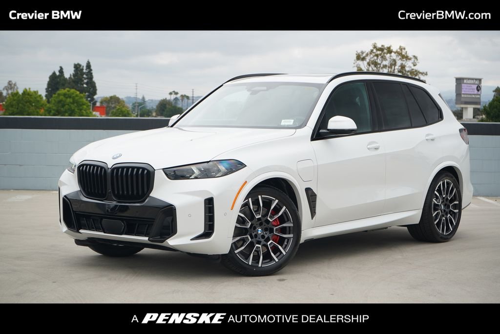 New 2026 Mineral White Metallic BMW xDrive50e image 1