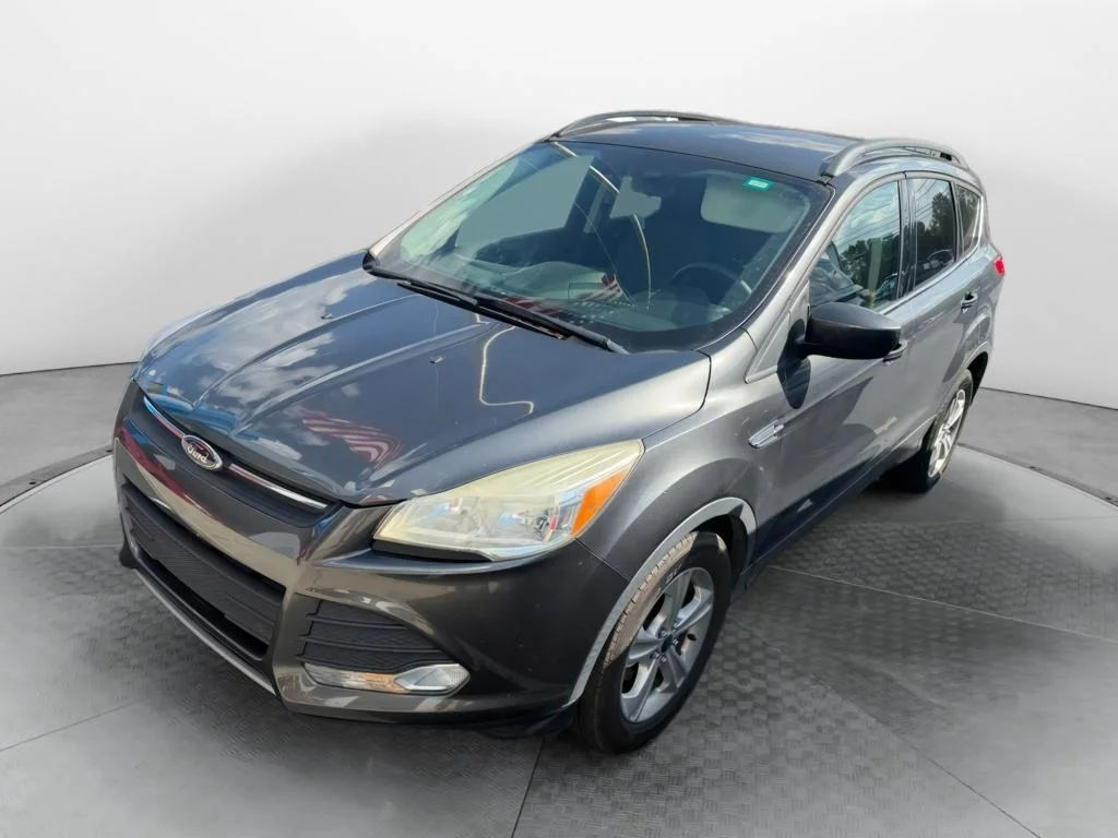 Used 2016 Gray Ford SE image 1