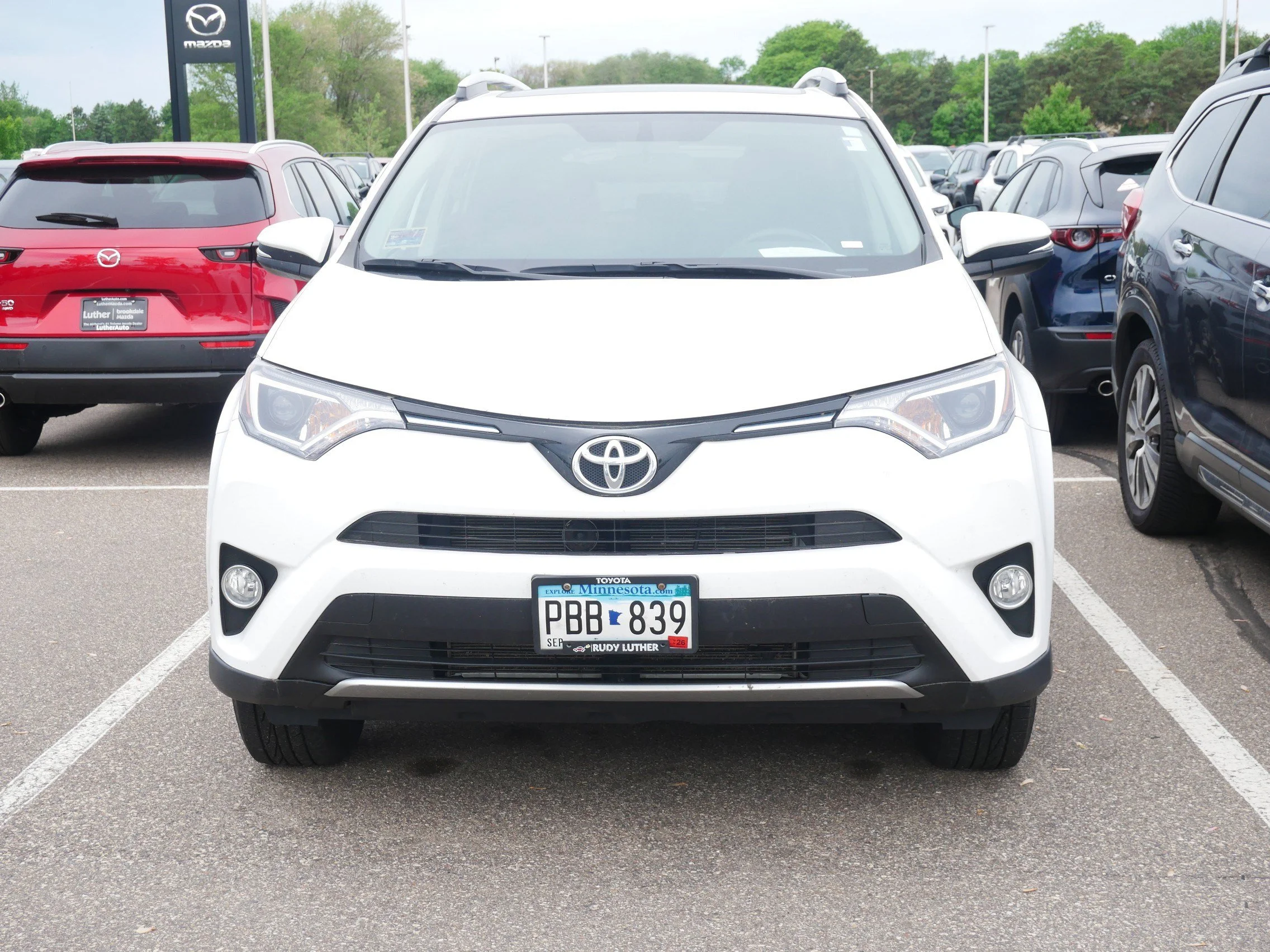 Used 2016 Toyota RAV4 XLE with VIN 2T3RFREV8GW536554 for sale in Brooklyn Center, Minnesota