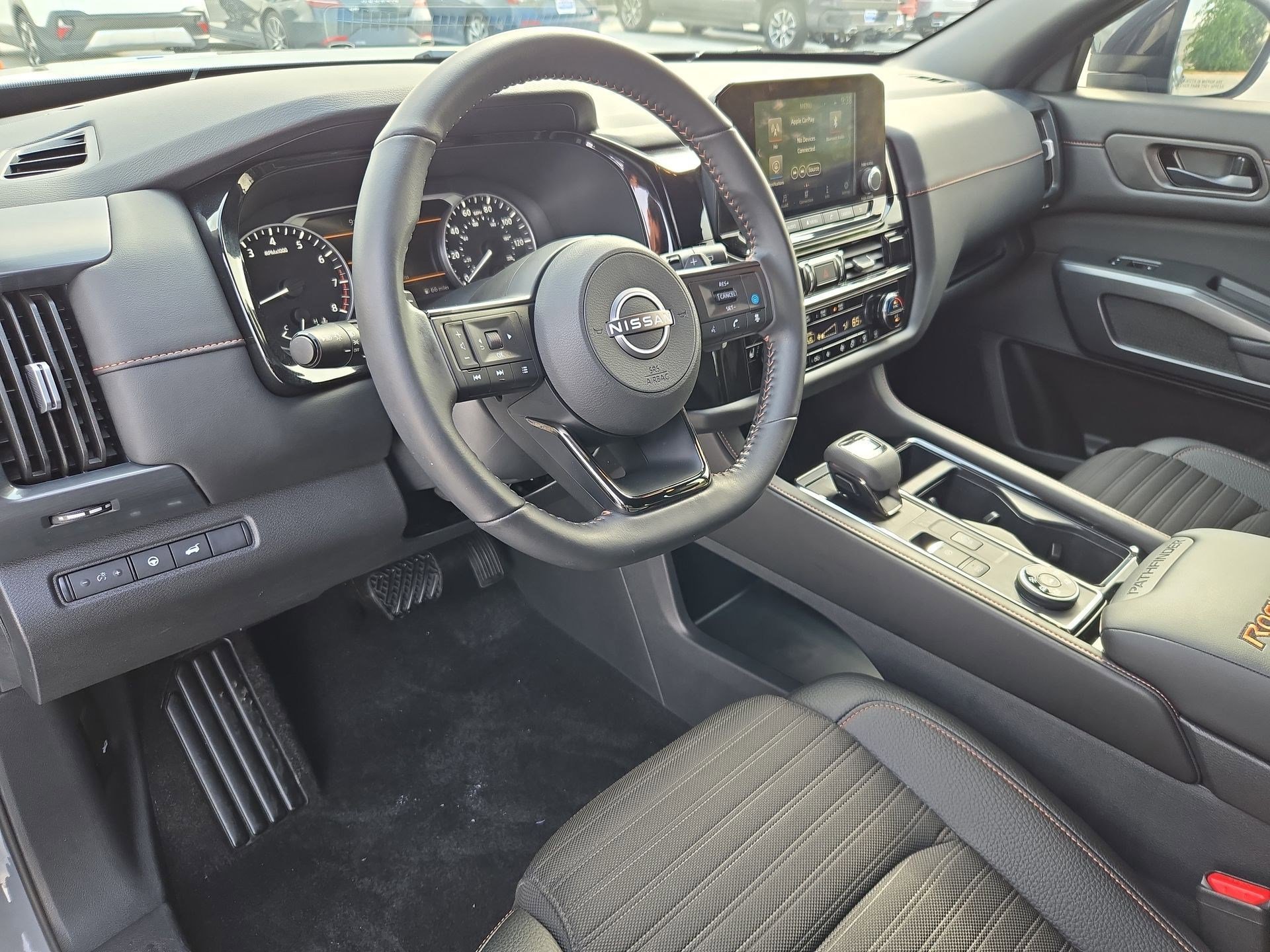 Used 2025 Solid Gray/Super Black Nissan Rock Creek image 12