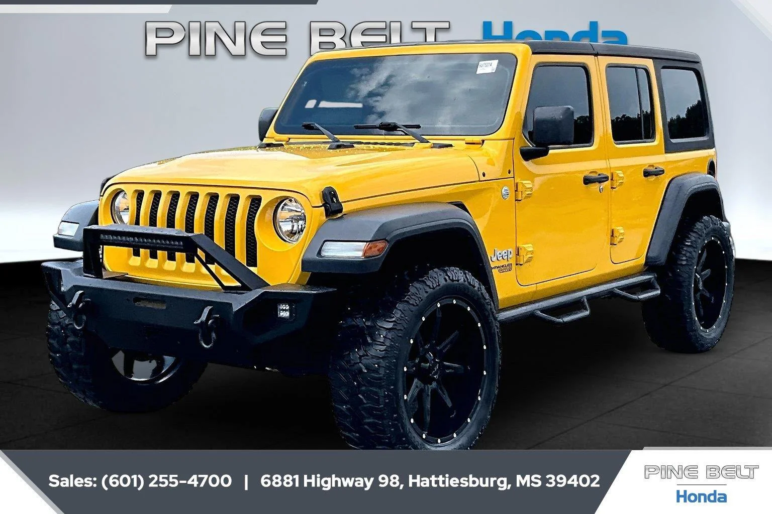 Used 2019 Hellayella Clearcoat Jeep Sport S image 1