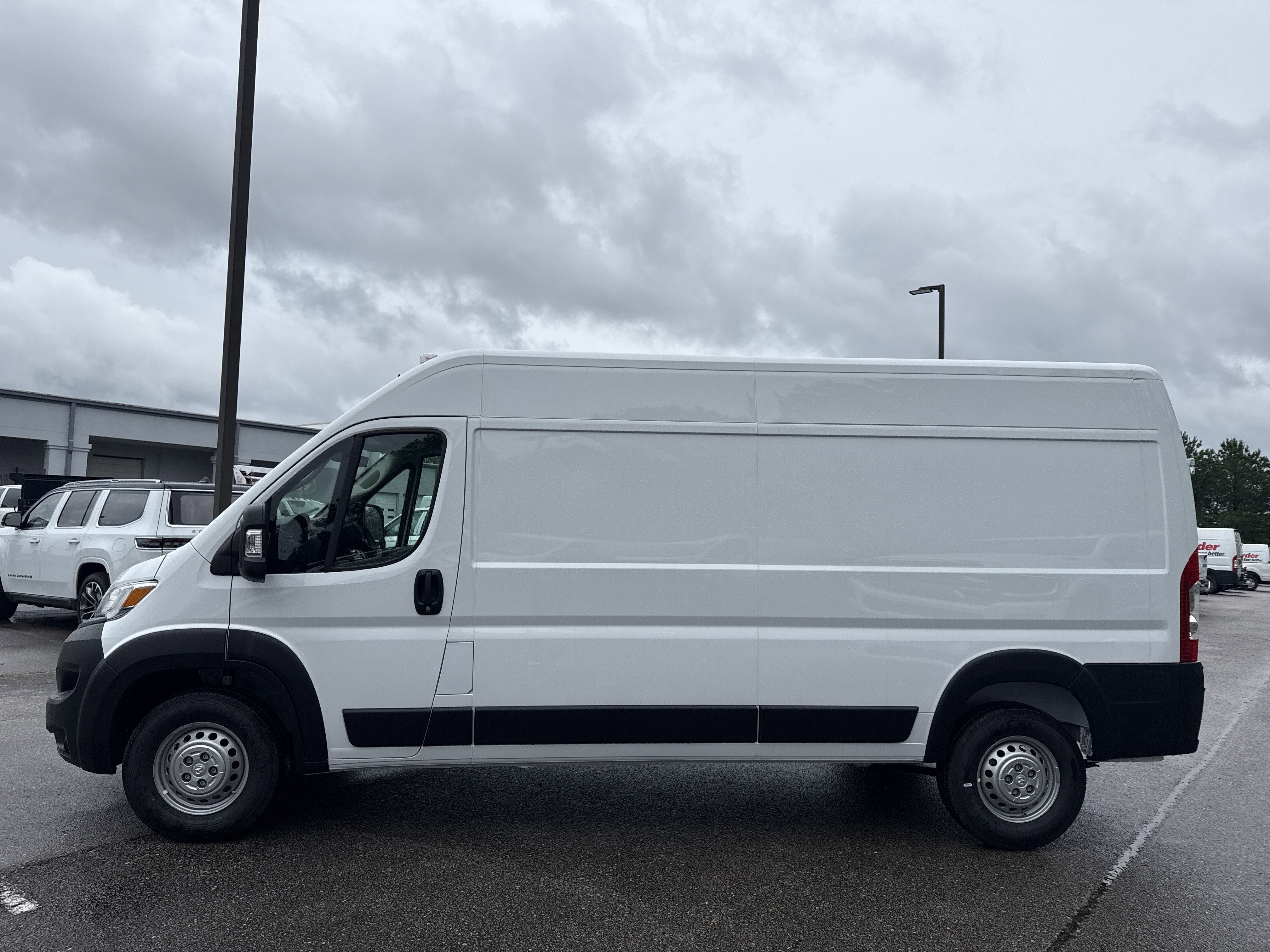 New 2026 Bright White Clearcoat RAM High Roof image 4