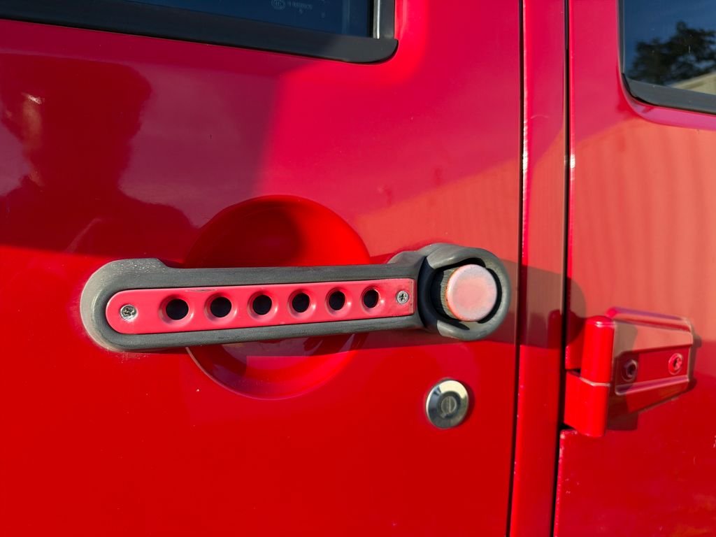 Used 2015 Red Jeep Unlimited Sport image 9