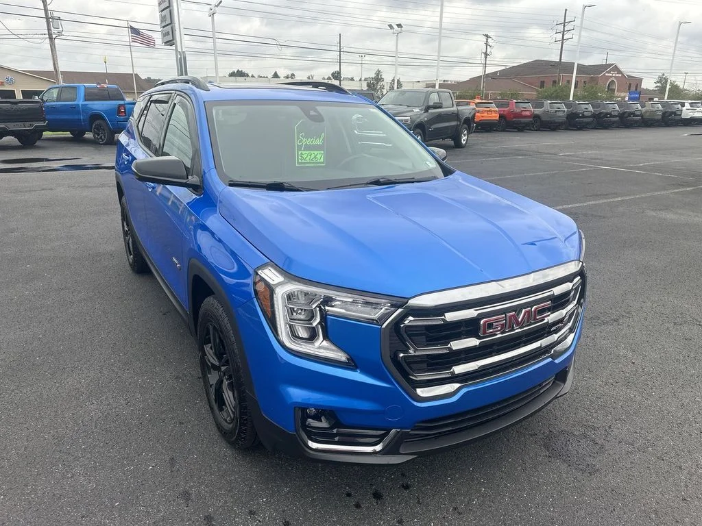 Used 2024 Blue GMC AT4 image 1