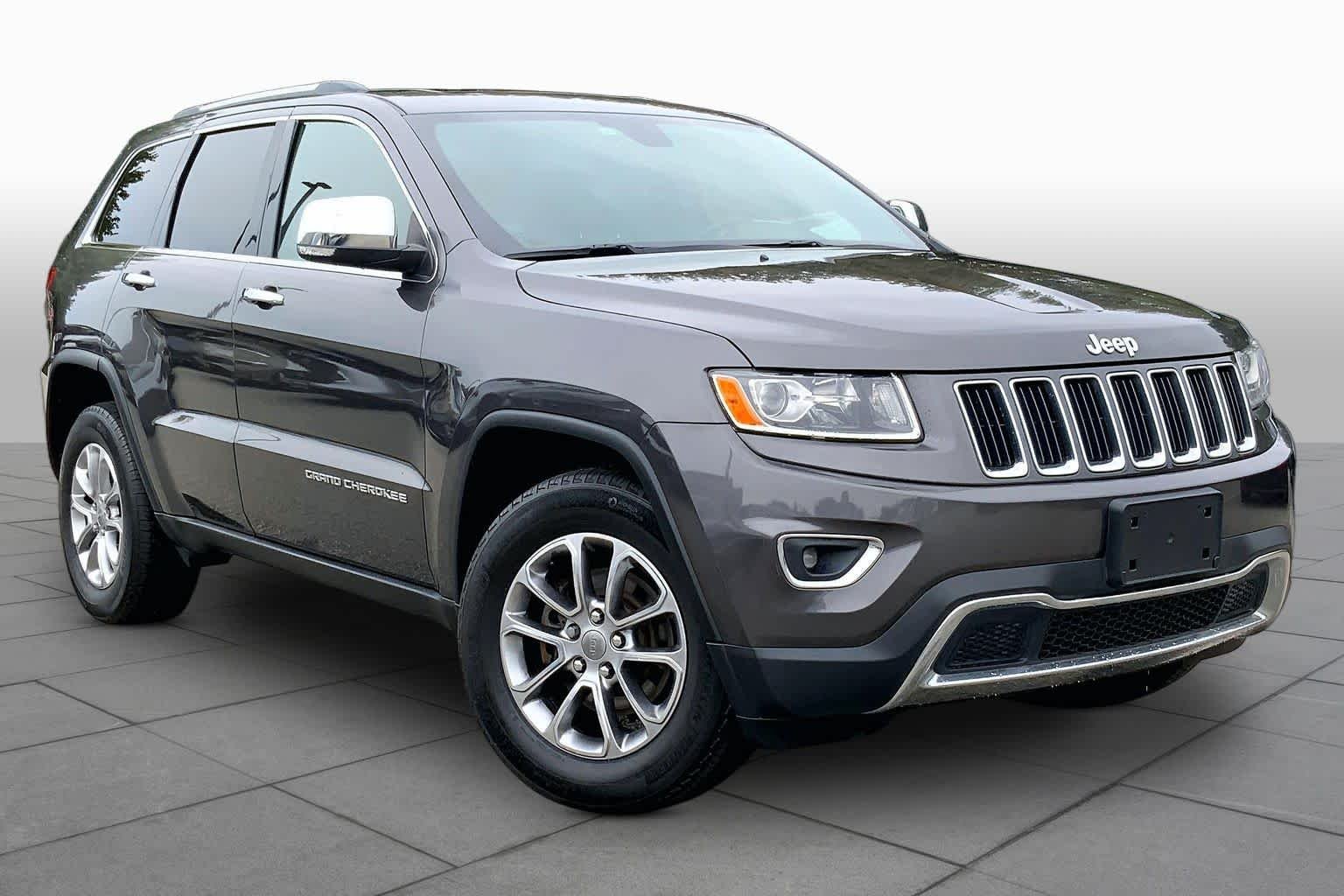 Used 2016 Granite Crystal Metallic Clearcoat Jeep Limited image 3