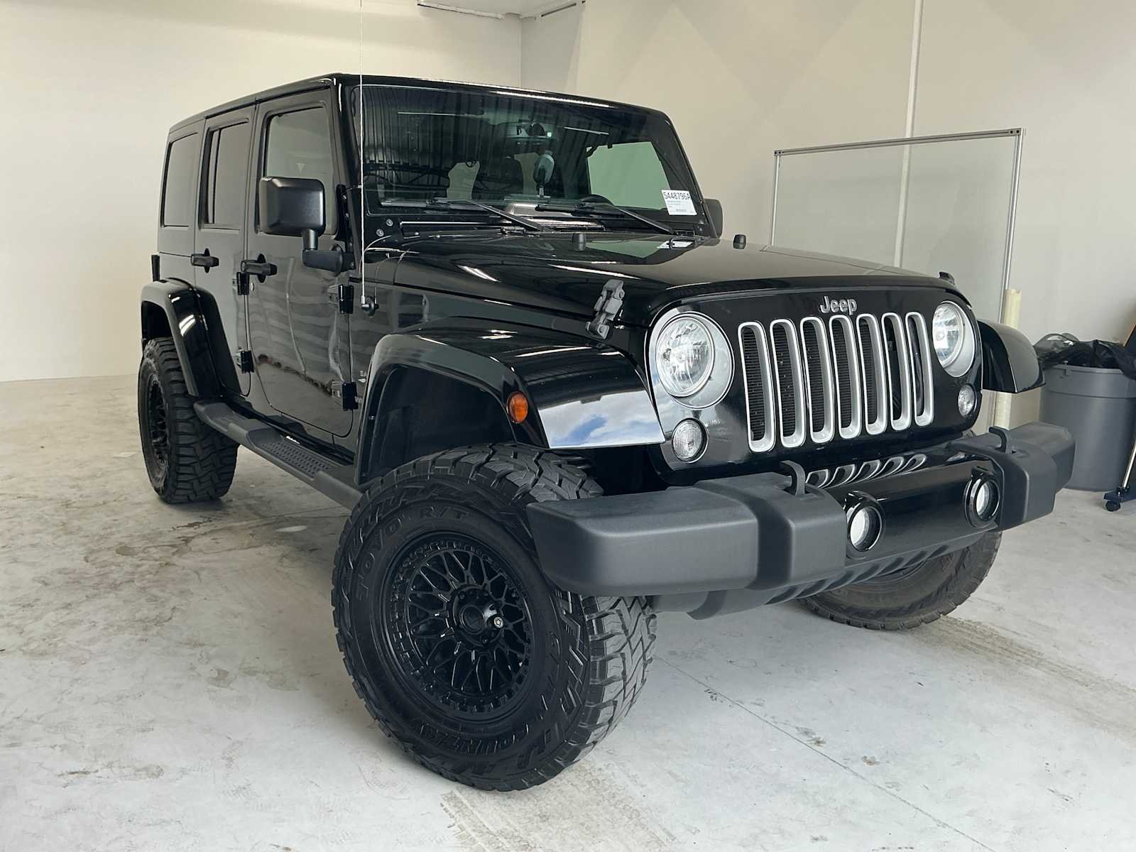 Used 2016 Black Clearcoat Jeep Sahara image 3