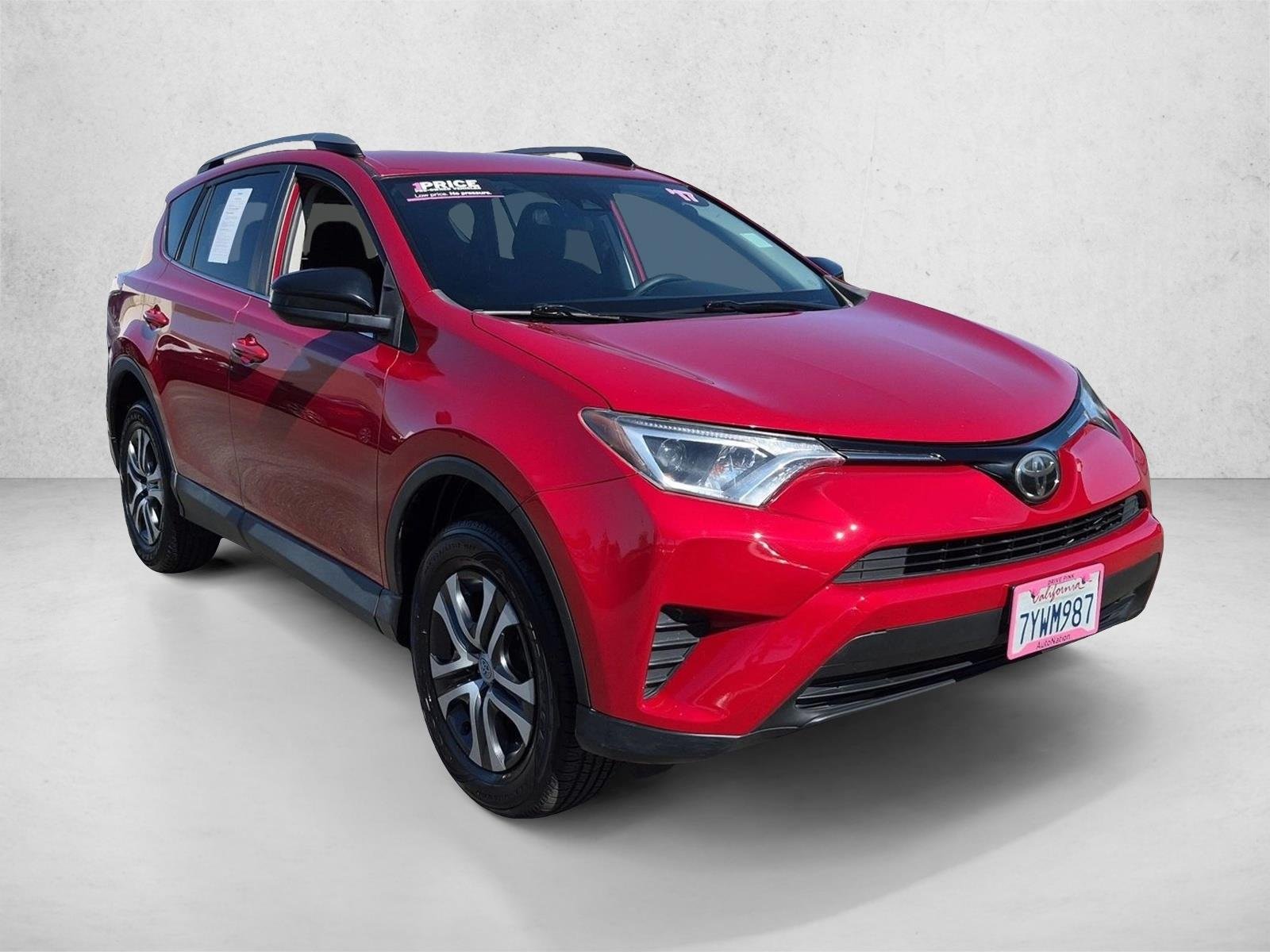 Used 2017 Barcelona Red Metallic Toyota LE image 3