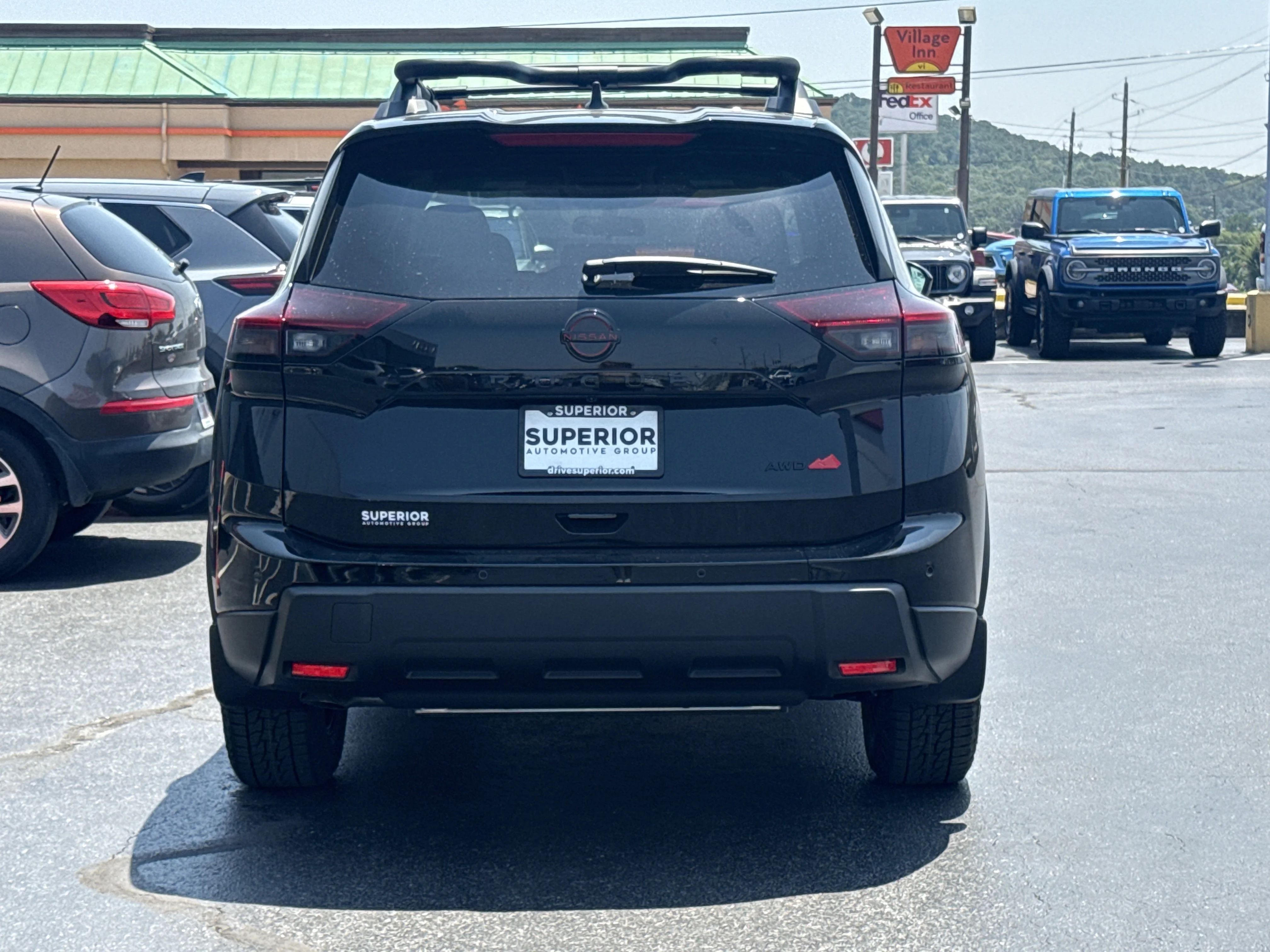 New 2026 Super Black Nissan Rock Creek AWD image 4