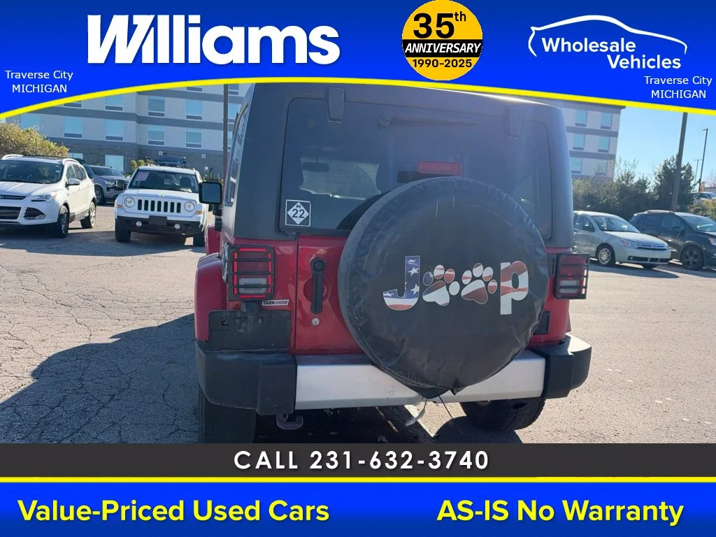 Used 2013 Flame Red Jeep Unlimited Sahara image 8