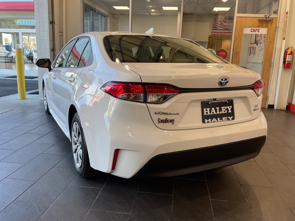 Used 2025 White Toyota LE image 6