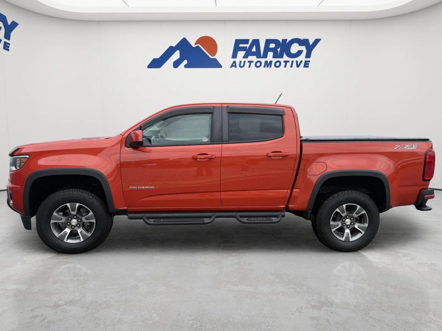 Used 2016 INFERNO ORANGE METALLIC Chevrolet 4WD Z71 image 2