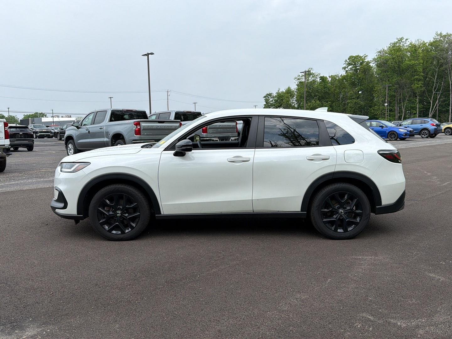 Used 2024 Platinum White Pearl Honda Sport image 9