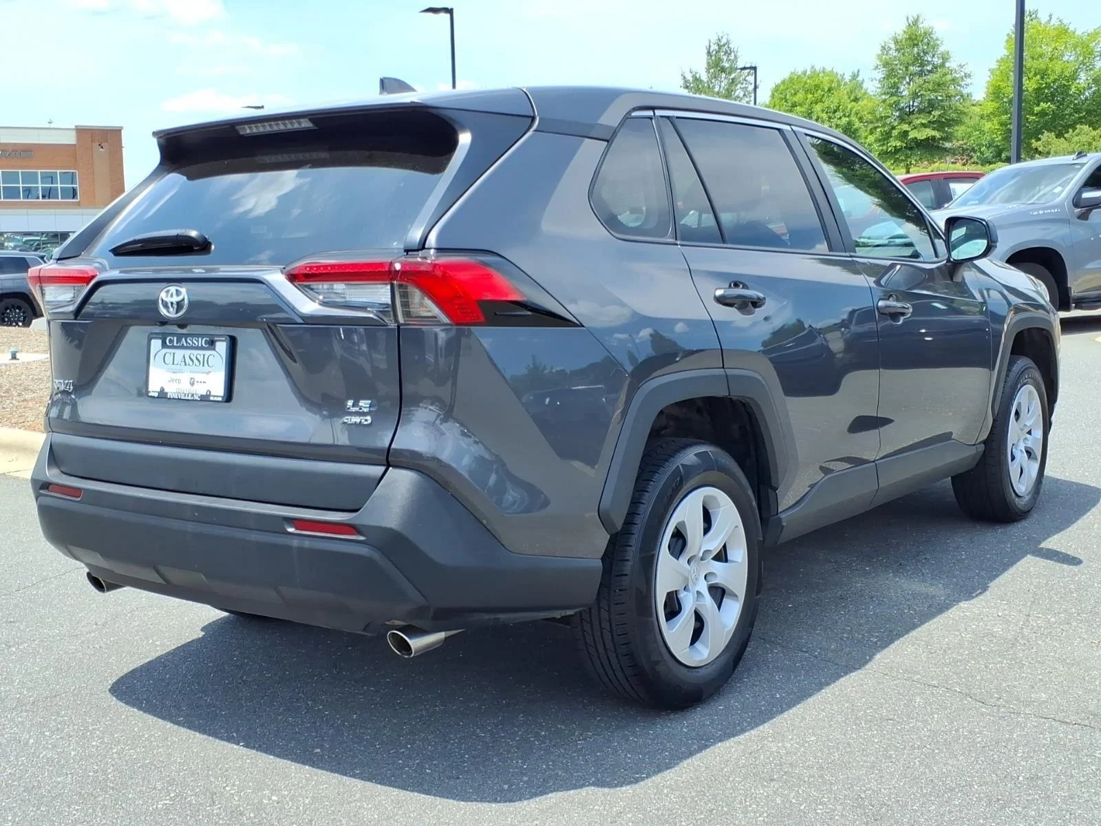 Used 2024 Magnetic Gray Metallic Toyota LE image 2