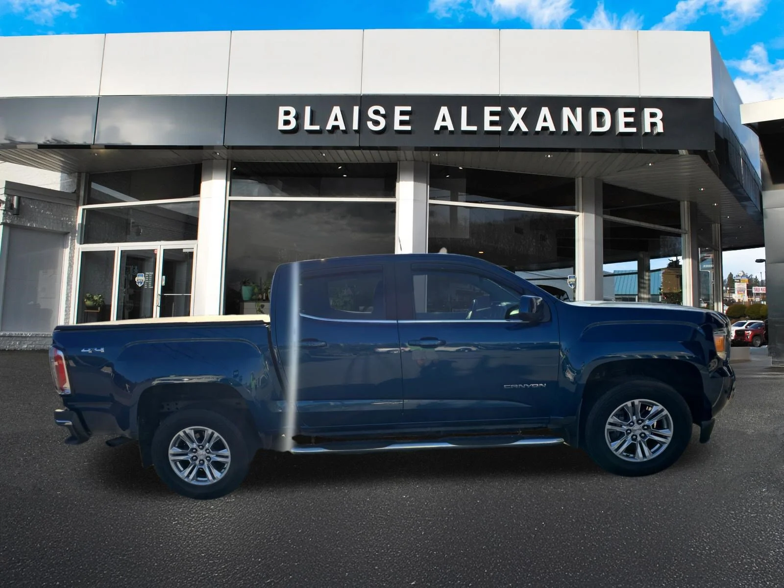 Used 2019 Blue Emerald Metallic GMC 4WD SLE image 2