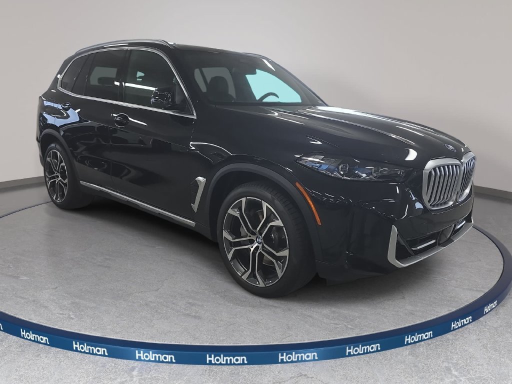 New 2026 Black Sapphire Metallic BMW xDrive50e image 3