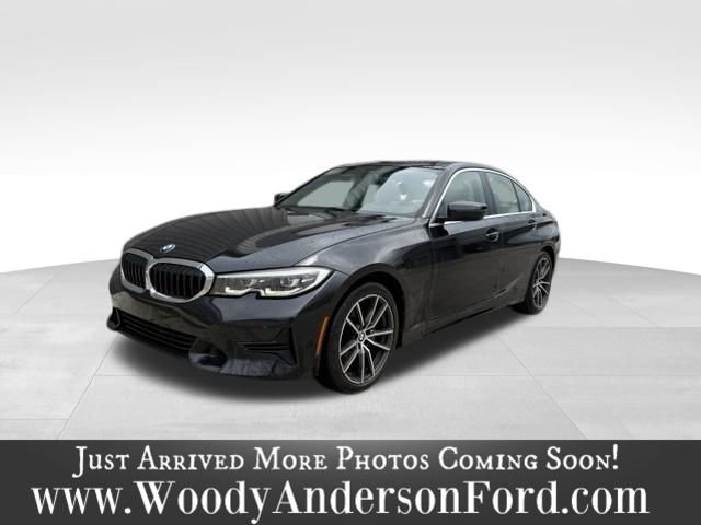 Used 2021 Black Sapphire Metallic BMW 330i image 1