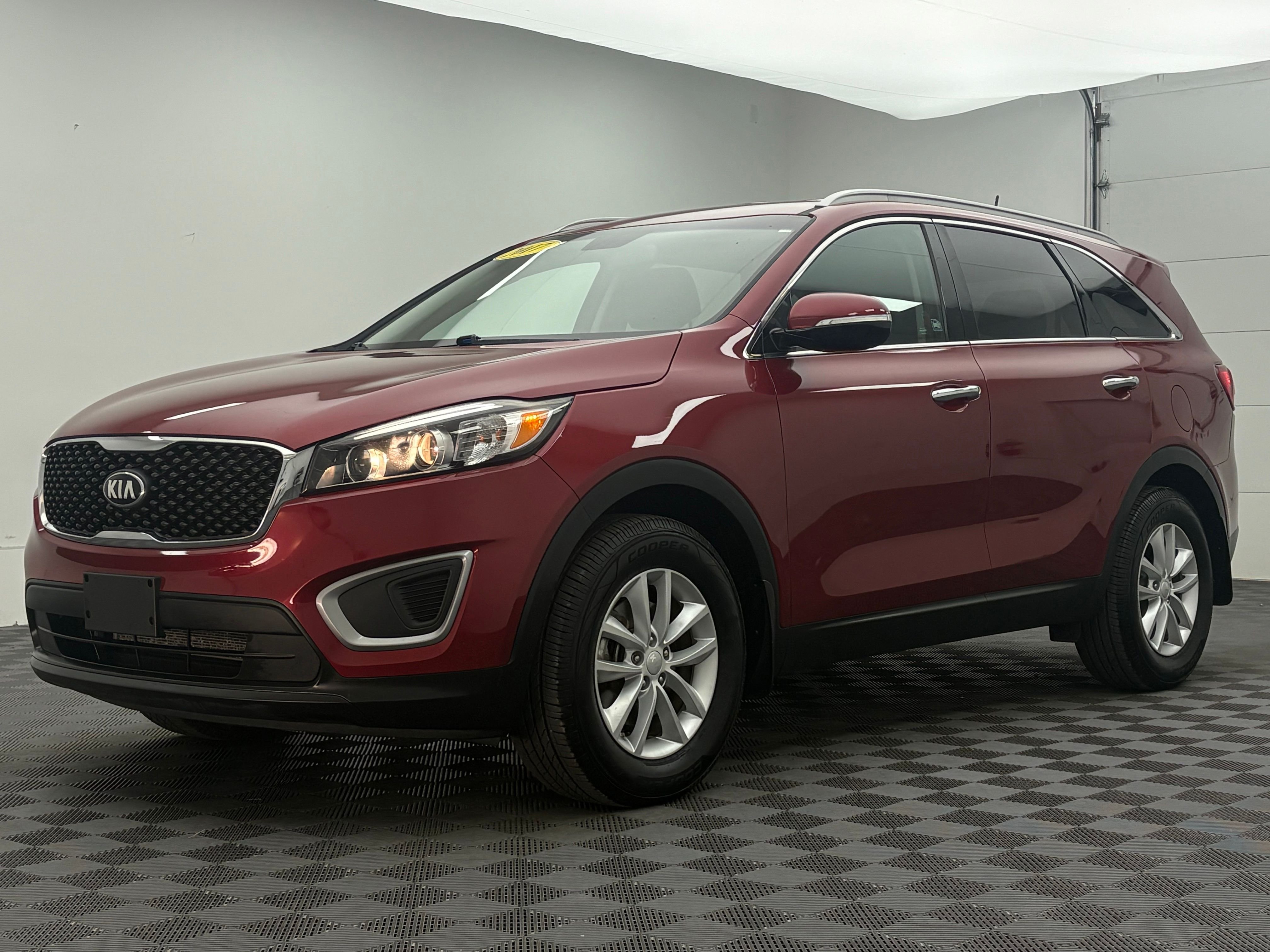 Used 2017 Remington Red Metallic Kia LX image 2