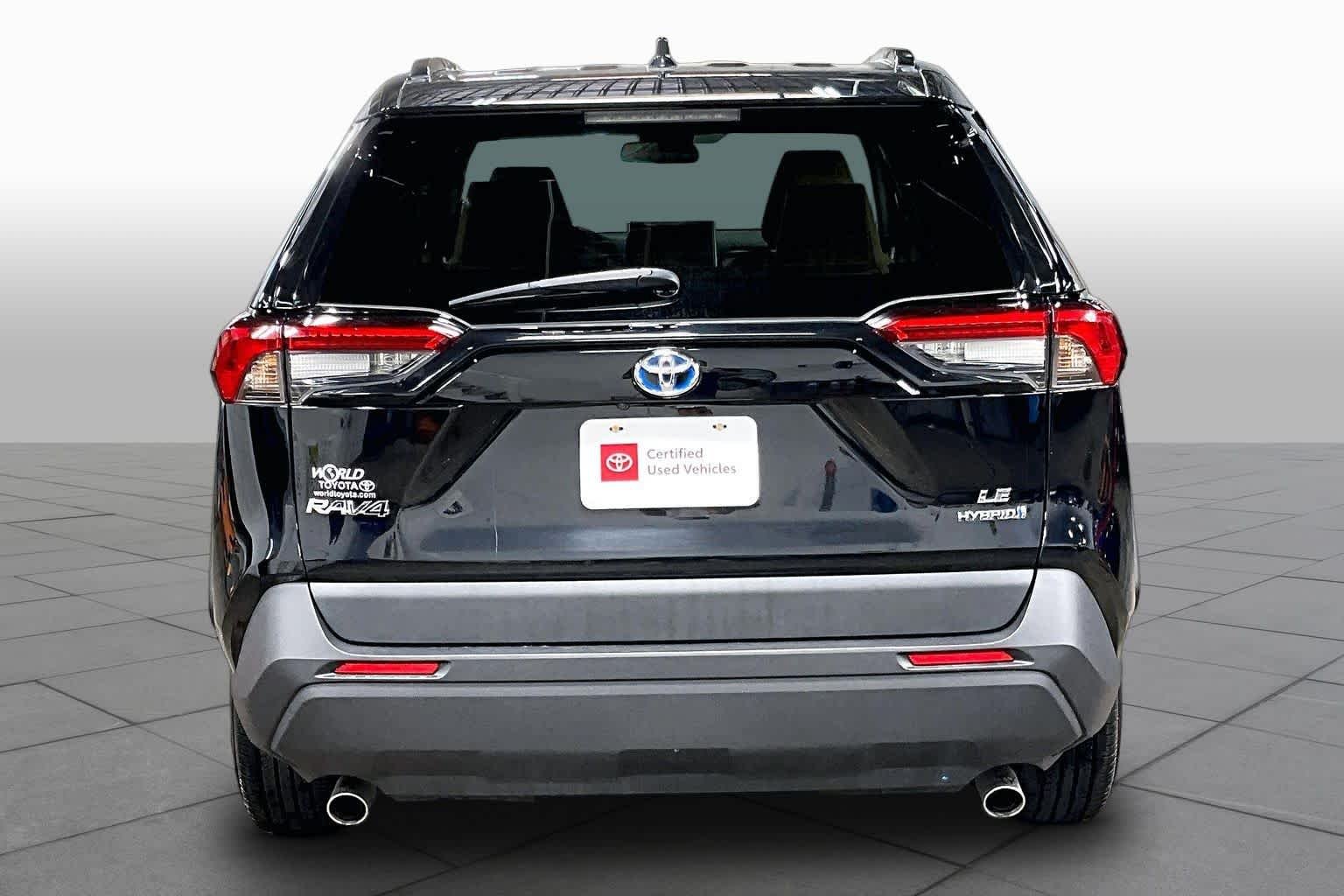 Used 2024 Midnight Black Metallic Toyota Hybrid LE image 5