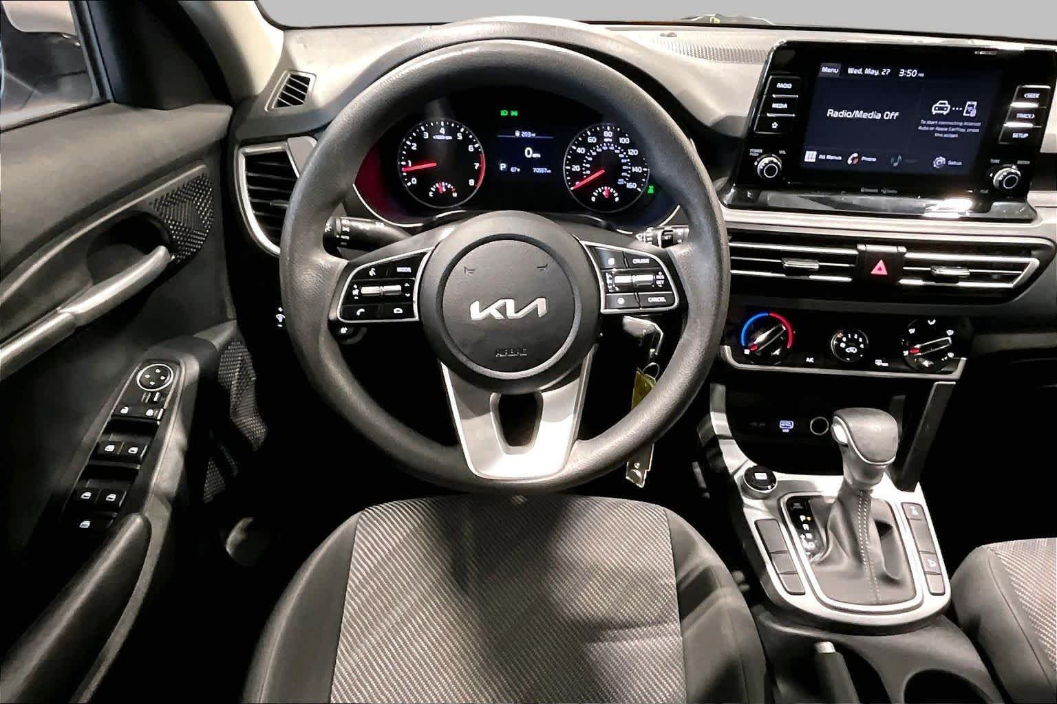 Used 2023 Snow White Pearl Kia LX image 6
