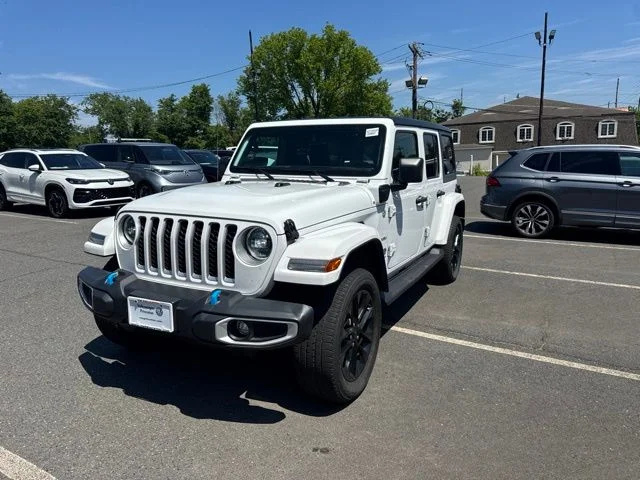 Used 2023 White Jeep Sahara 4xe image 1
