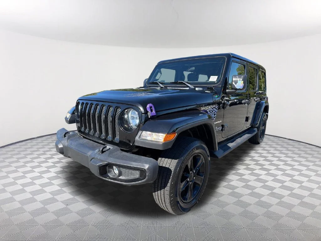 Used 2020 Black Jeep Unlimited Sahara Altitude image 1