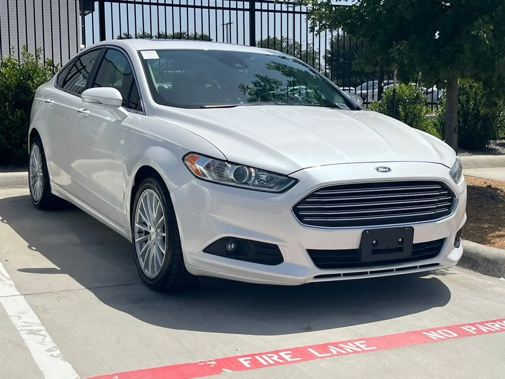 Used 2016 White Ford Titanium image 1
