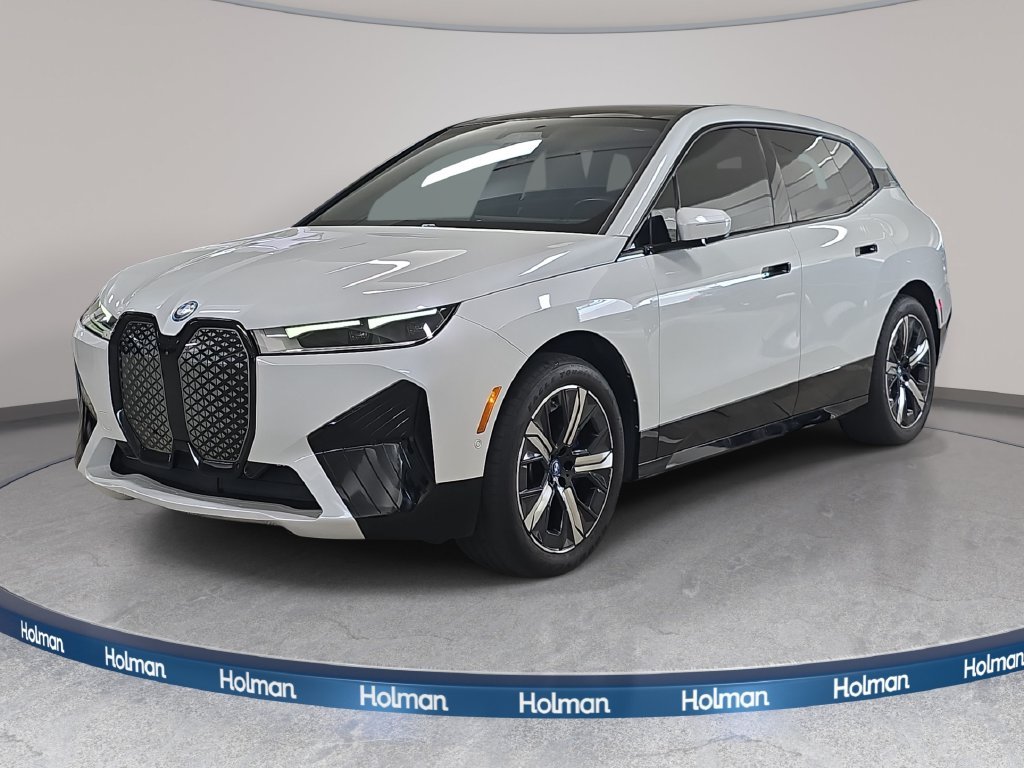 Used 2024 Mineral White Metallic BMW xDrive50 image 1