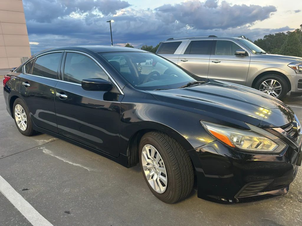 Used 2017 Super Black Nissan 2.5 S image 3
