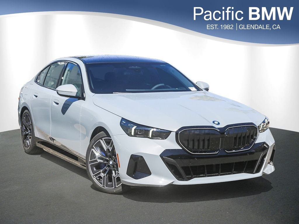 New 2027 Brooklyn Grey Metallic BMW 550e xDrive image 1