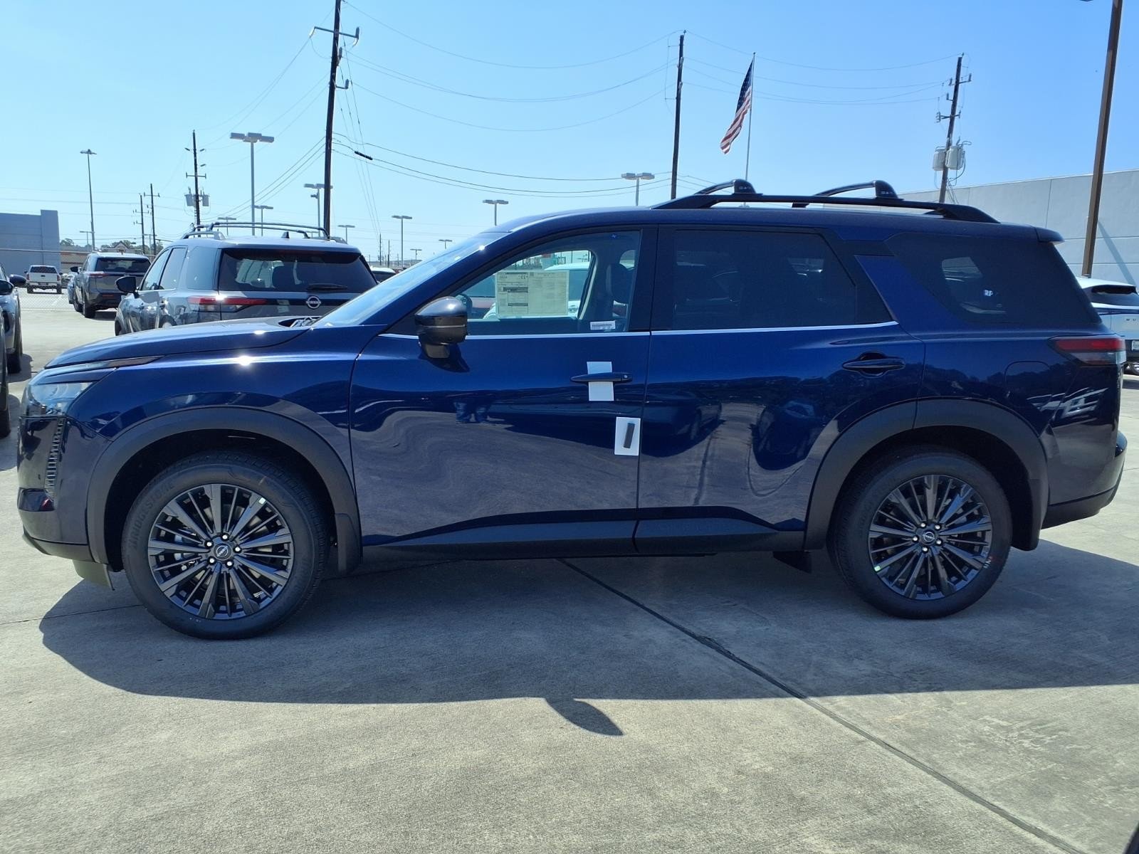New 2026 Deep Ocean Blue Pearl Nissan SL image 8